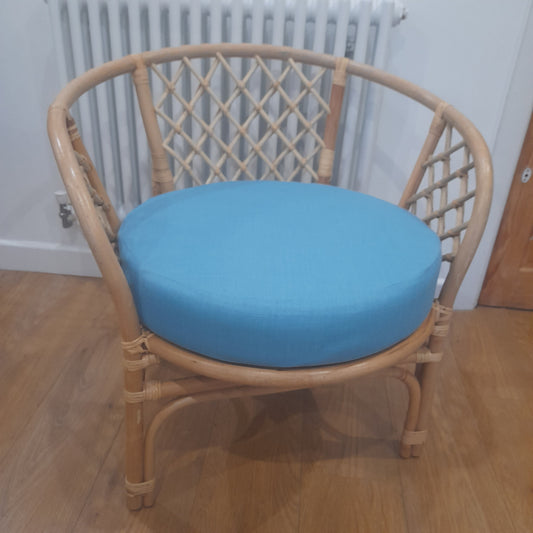 Cane and Wicker Bahama Conservatory Stackable Chair and Ocean Blue Seat Cushion.
