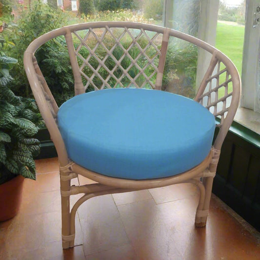 Cane and Wicker Bahama Conservatory Stackable Chair and Ocean Blue Seat Cushion.