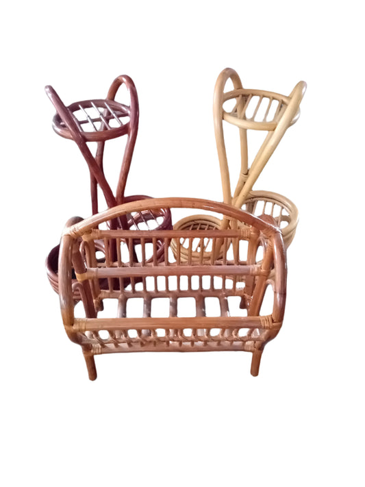 2x Cane triple plant holders and 1x cane magazine rack.